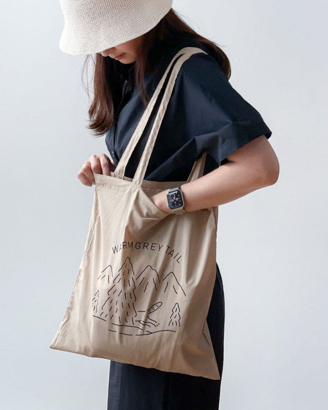 【バーンストア】WARMGREY TAIL / LOGO BAG - BEIGE ファブリックバッグ