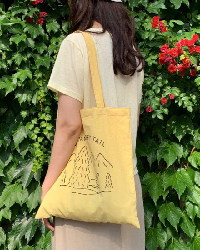 【バーンストア】WARMGREY TAIL / LOGO BAG - CUSTARD YELLOW ファブリックバッグ