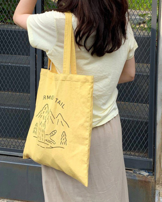 【バーンストア】WARMGREY TAIL / LOGO BAG - CUSTARD YELLOW ファブリックバッグ