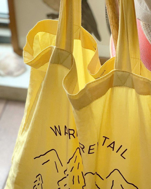 【バーンストア】WARMGREY TAIL / LOGO BAG - CUSTARD YELLOW ファブリックバッグ